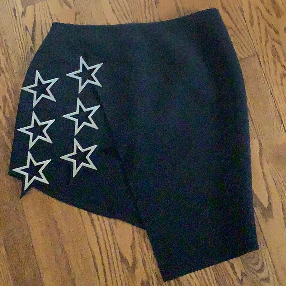 Black mi I skirt with star grommets